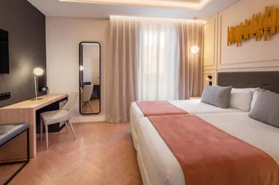 Cama o camas de una habitación en Catalonia Goya