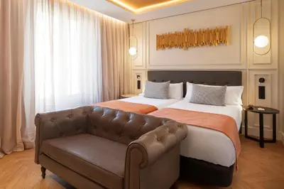 Cama o camas de una habitación en Catalonia Goya