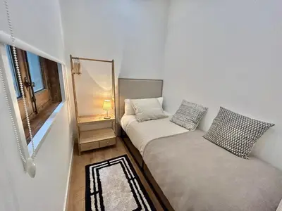 Cama o camas de una habitación en Reina Sofía Museum House