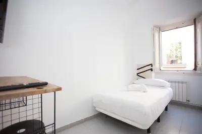 Cama o camas de una habitación en Gran Via Experience