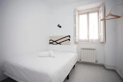 Cama o camas de una habitación en Gran Via Experience