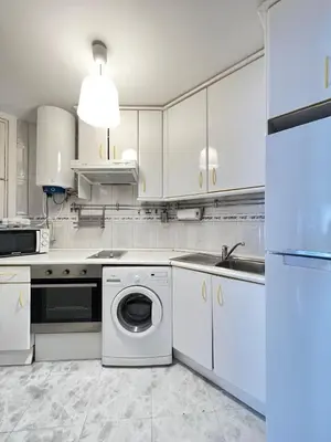 Una cocina o zona de cocina en Lovely studio con balconcitos
