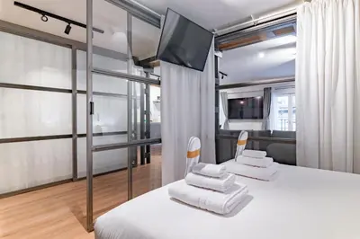 Cama o camas de una habitación en Exclusivo Apartamento en Sol