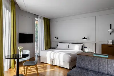 Cama o camas de una habitación en TÓTEM Madrid, a Small Luxury Hotel of the World