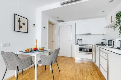 Una cocina o zona de cocina en New Heima Gran Vía D