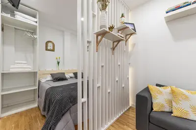 Cama o camas de una habitación en Waou El Rastro I - Alquiler Corta Duración