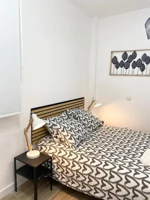 Cama o camas de una habitación en China Town Madrid 01