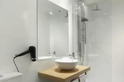 Un baño de Petit Palace Tres Cruces