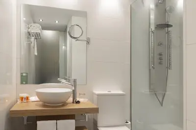 Un baño de Petit Palace Plaza del Carmen