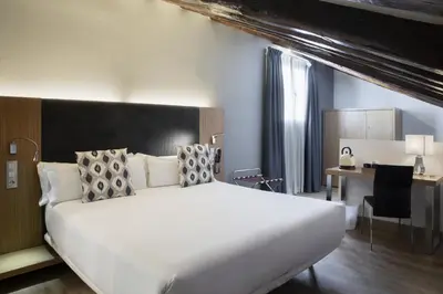 Cama o camas de una habitación en Petit Palace Plaza del Carmen