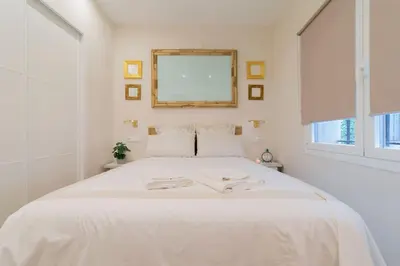 Cama o camas de una habitación en Candido Apartamento en el Corazón de La Latina