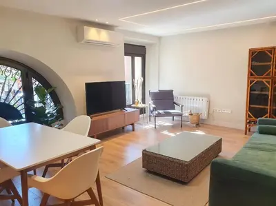Una televisión o centro de entretenimiento en Luxury Apartment Museum Mile Atocha 2