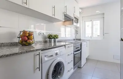 Una cocina o zona de cocina en Plaza de las Ventas II - Diseño, confort y buena ubicación