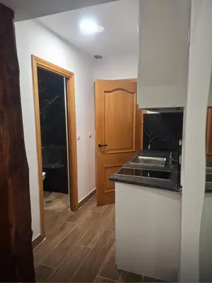 Una cocina o zona de cocina en Infantas Corazón de Chueca 3