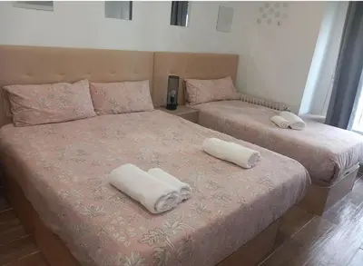 Cama o camas de una habitación en Infantas Corazón de Chueca 3