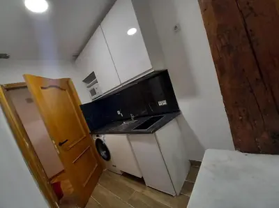 Una cocina o zona de cocina en Infantas Corazón de Chueca 3