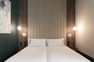 Cama o camas de una habitación en ICON Wipton