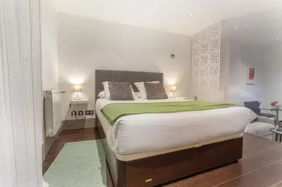 Cama o camas de una habitación en Apartamento Cibeles Studio en Madrid