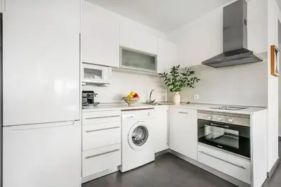 Una cocina o zona de cocina en New Heima Colon Square
