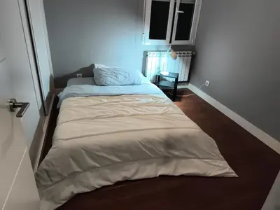 Cama o camas de una habitación en Hab compartida masculina