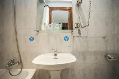 Un baño de Pensión Carrera