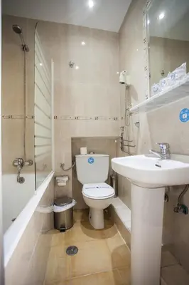 Un baño de Pensión Carrera