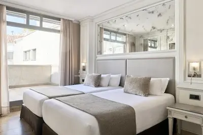 Cama o camas de una habitación en VP Jardín de Recoletos