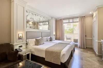 Cama o camas de una habitación en VP Jardín de Recoletos