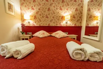 Cama o camas de una habitación en Hostal Matheu