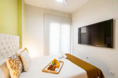 Una televisión o centro de entretenimiento en Global Home-Pico Cebollera