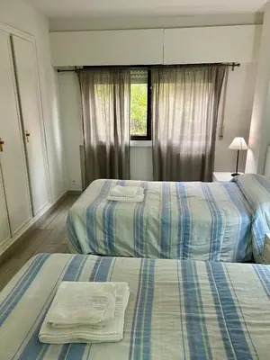 Cama o camas de una habitación en Apartamentos Goya 75