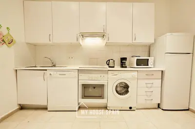 Una cocina o zona de cocina en MyHouseSpain - Apartamento en Chueca