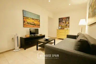 Una televisión o centro de entretenimiento en MyHouseSpain - Apartamento en Chueca