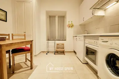 Una cocina o zona de cocina en MyHouseSpain - Apartamento en Chueca