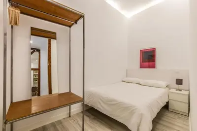Cama o camas de una habitación en MyHouseSpain - Luxury flat next to Gran Vía