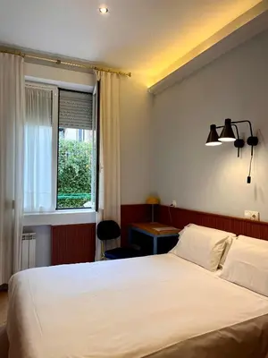 Cama o camas de una habitación en Hostal La Vera