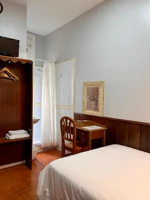 Cama o camas de una habitación en Hostal La Vera