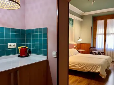 Cama o camas de una habitación en Hostal La Vera
