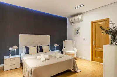 Cama o camas de una habitación en Waou Apartamentos en Sol Deluxe 3
