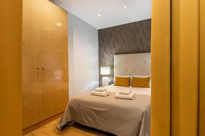 Cama o camas de una habitación en Waou Apartamentos en Sol Superior 1