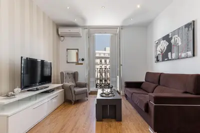 Una televisión o centro de entretenimiento en Waou Apartamentos en Sol Superior 1