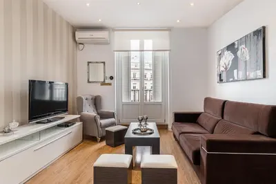 Una televisión o centro de entretenimiento en Waou Apartamentos en Sol Superior 1