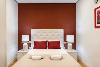 Cama o camas de una habitación en Waou Apartamentos en Sol Superior 2