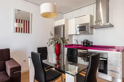 Una cocina o zona de cocina en Waou Apartamentos en Sol Superior 2