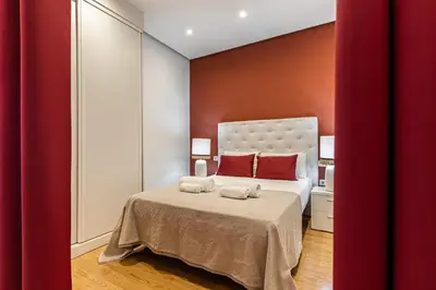 Cama o camas de una habitación en Waou Apartamentos en Sol Superior 2