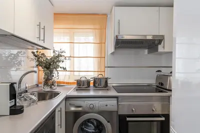 Una cocina o zona de cocina en Waou Apartamentos en Sol Confort 1