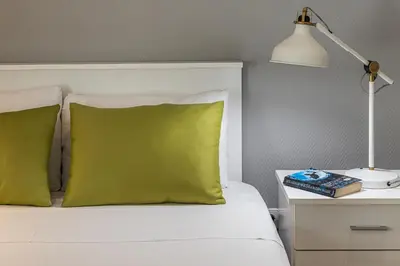 Cama o camas de una habitación en Waou Apartamentos en Sol Confort 2