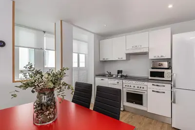 Una cocina o zona de cocina en Waou Apartamentos en Sol Confort 2