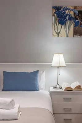 Cama o camas de una habitación en Waou Apartamentos en Sol Confort 3