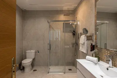 Un baño de Waou Apartamentos en Sol Confort 3